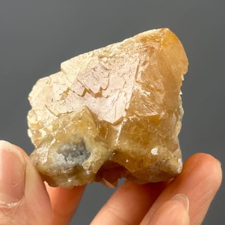 Vibrant orange scheelite crystal cluster from Xuebaoding, Pingwu, Sichuan