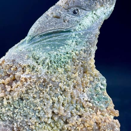 Hand-carved grape agate pterosaur sculpture from Indonesia