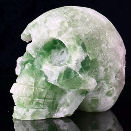 Hand-carved green fluorite skull front view