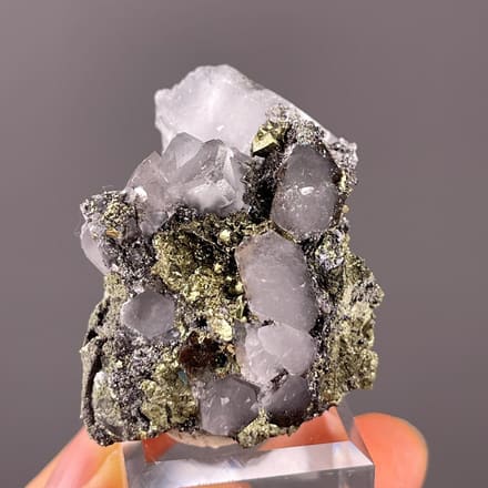 Front view of colorless fluorite with pyrite from Hunan