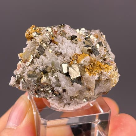 Front view of cubic pyrite cluster from Spain