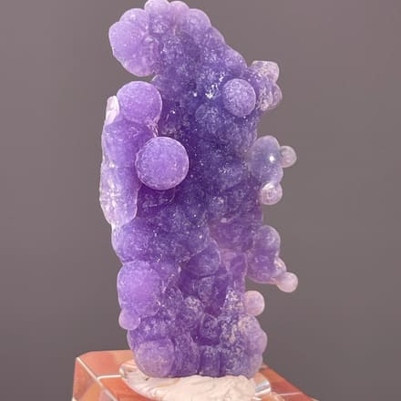 Front view of vivid purple grape agate from Mamuju