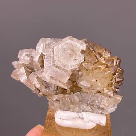 Calcite with Quartz specimen from Longyan, Fujian, China featuring cream tabular rosette blades