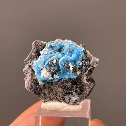 Gibbsite specimen from Guizhou, China featuring bright blue botryoidal cavity
