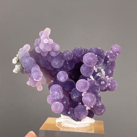 Grape Agate from Indonesia: large purple nodules forming a broad branching cluster.