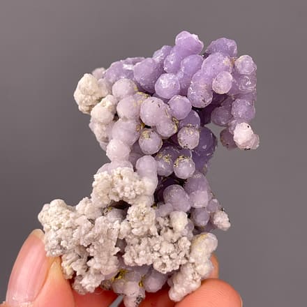 Grape Agate specimen from Indonesia featuring lavender botryoidal chalcedony spheres