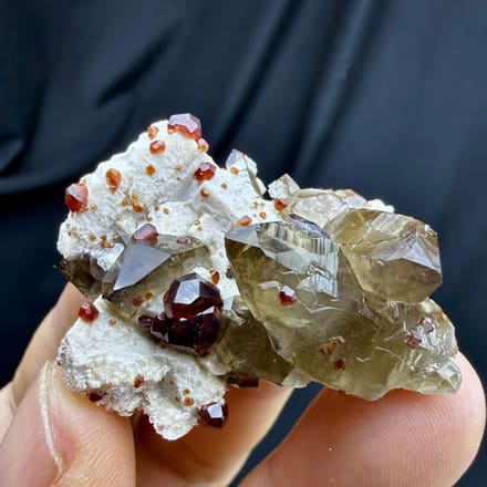 Smoky quartz with red garnets and hyalite opal on feldspar from Yunxiao, Fujian, China