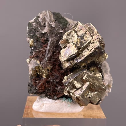 Pyrite specimen from Longyan, Fujian, China featuring striated silver-brassy blocky crystals