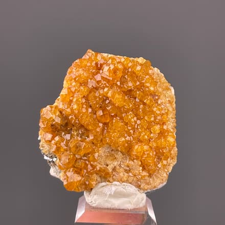 Spessartine Garnet specimen from Yunxiao, Fujian, China featuring orange-brown crystal druse