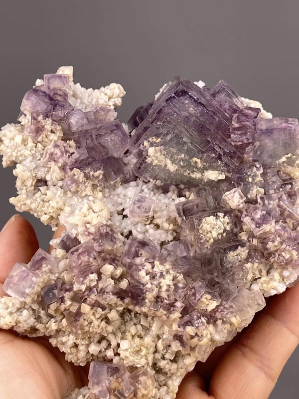 Green Fluorite Crystal Cluster from Shangbao Mine, Hunan – angled view showing matrix