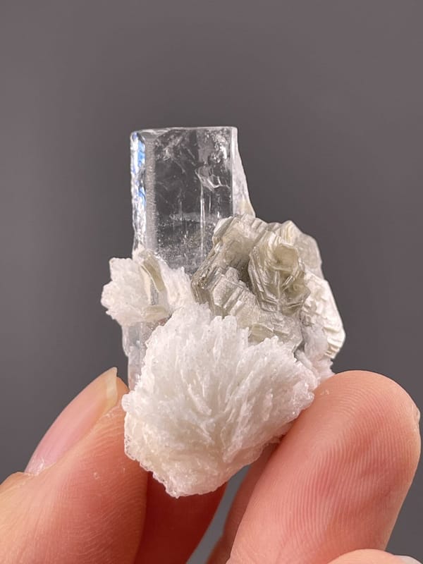 Detail of aquamarine surface showing vitreous luster and blue tone