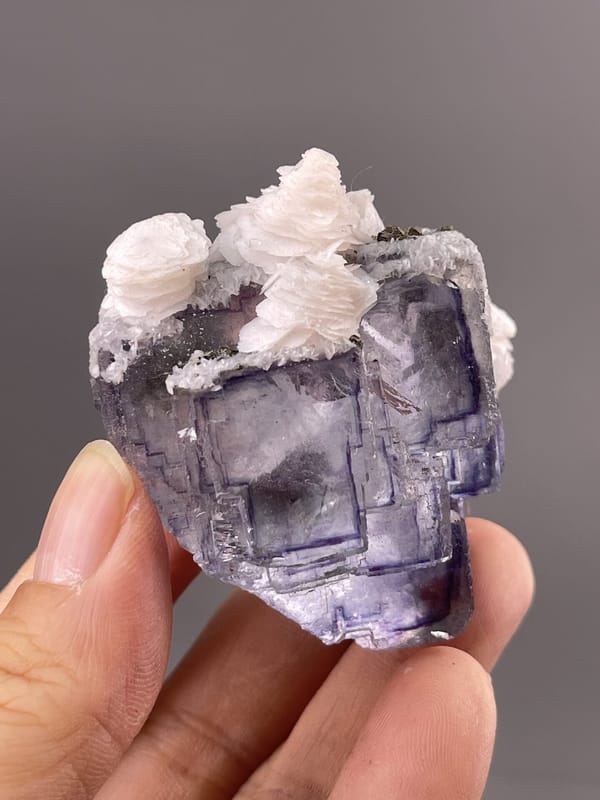 Fluorite Cubic Crystals from Chenzhou, China – angled view showing matrix
