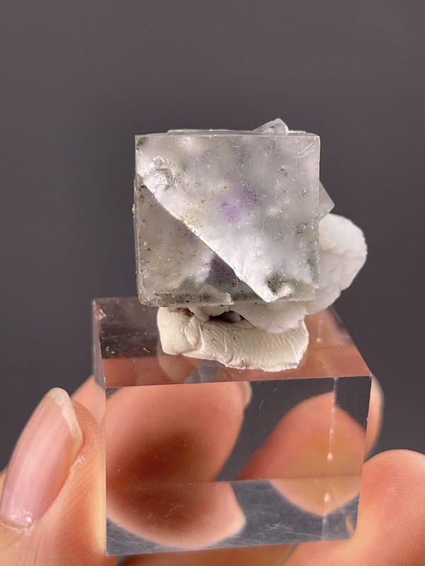 Close-up of fluorite cubic faces showing perfect transparency