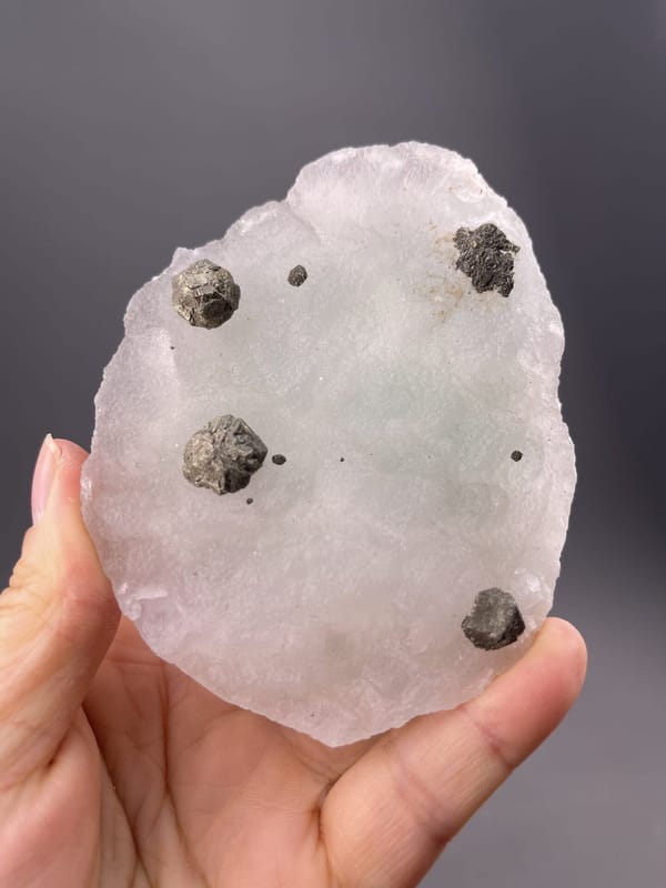 Side view of specimen showing fluorite crystal arrangement on matrix