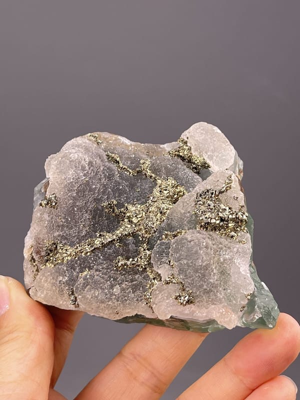 Side view of fluorite cluster showing crystal mass