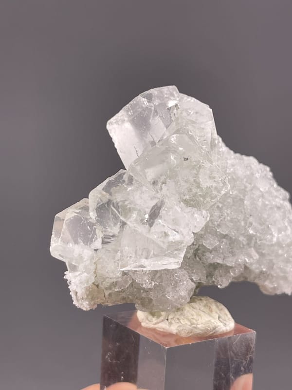 Close-up of green fluorite cube faces showing colour and luster