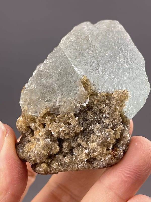 Fluorite Crystal with Color Variations from Yaogangxian Mine – angled view showing matrix