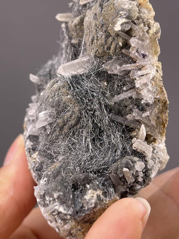 Needle-like bismuthinite showing metallic gray luster, 7.8 g