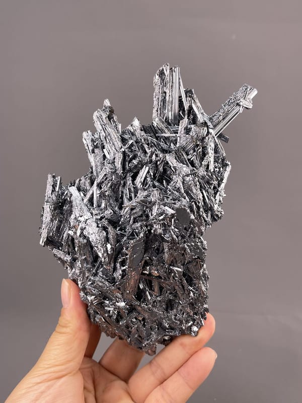 Stibnite Crystal Formation from Hunan, China – full specimen against white background