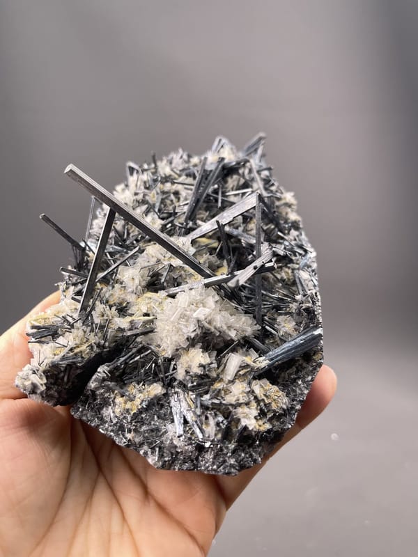 Stibnite Crystals from Hunan, China – full specimen against white background