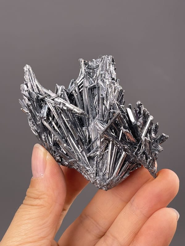 Close-up of acicular stibnite showing metallic gray needles