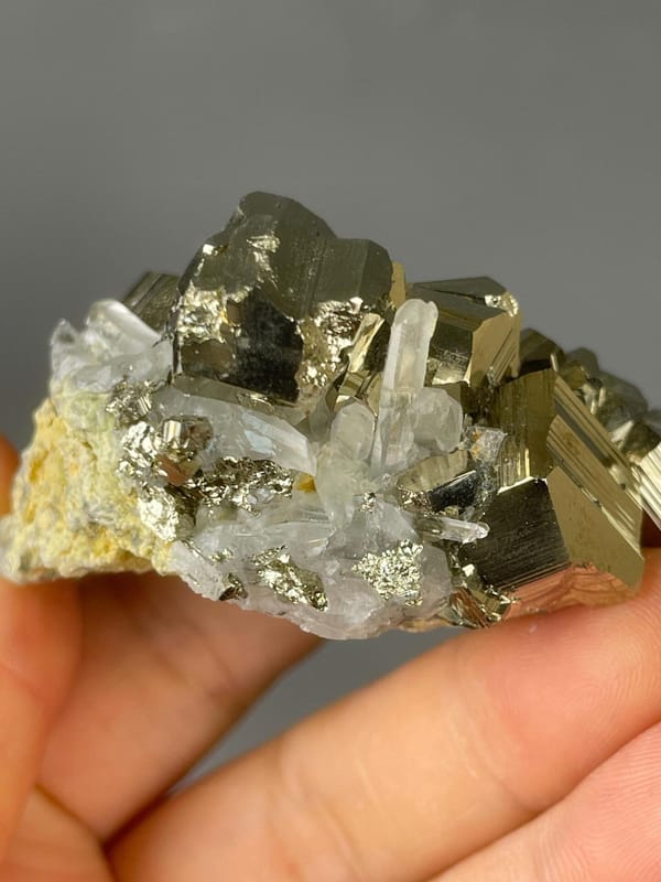 Top view of pyrite cluster with quartz overgrowth