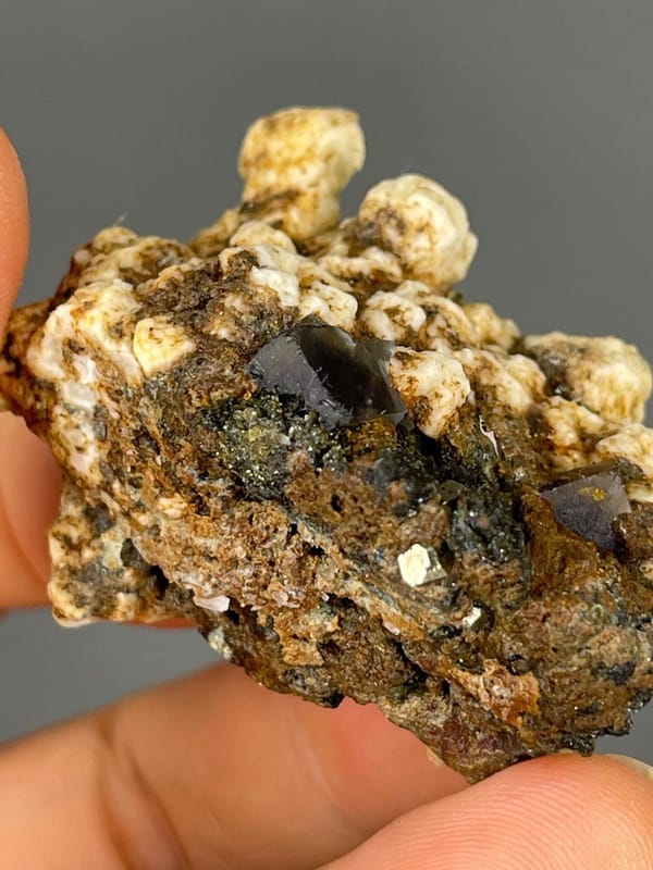 Vitreous luster on purple fluorite cube faces