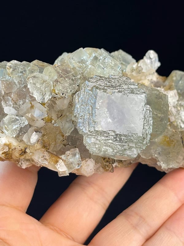 Side profile of step-cut fluorite showing layered growth