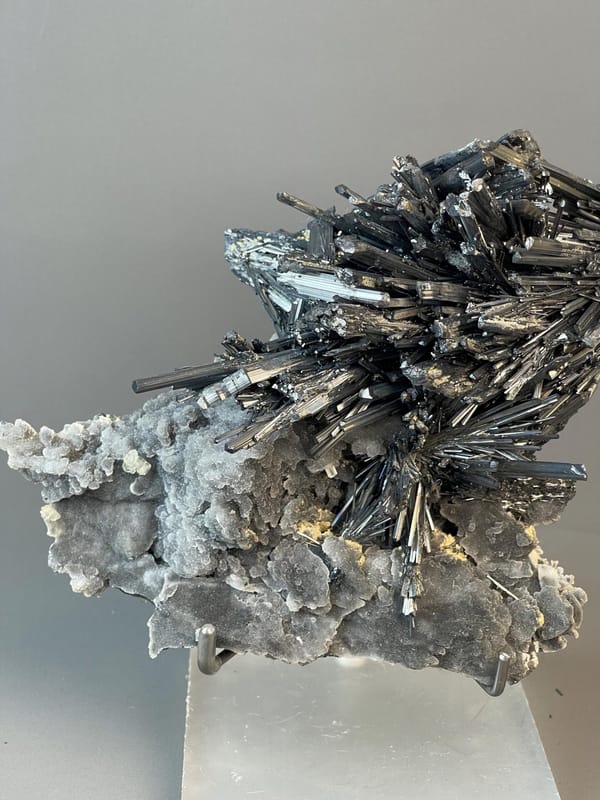 Back view of large stibnite crystal cluster