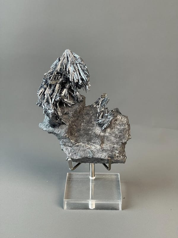 Close-up of interwoven stibnite crystal blades