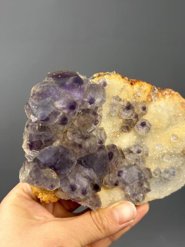 Side view of large purple fluorite slab