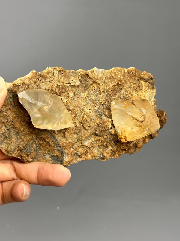 Side view of twin calcite on matrix Hunan
