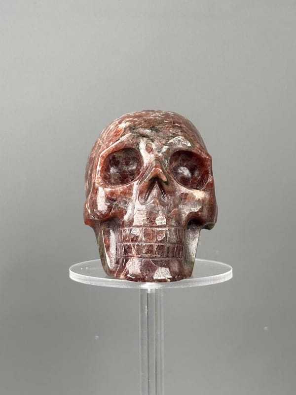 Red garnet skull base carved underside