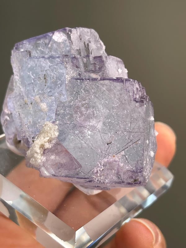 Fluorite with stepped cubic formation and metallic needle crystals