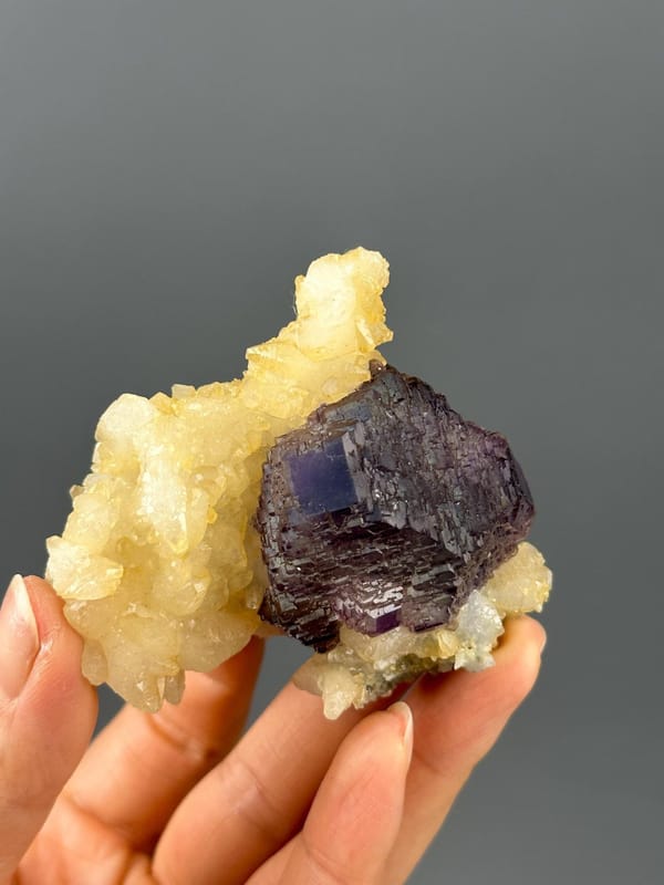 Back view of purple fluorite cluster