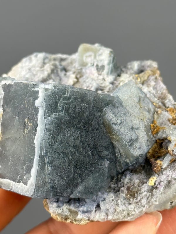 Full green fluorite cluster on white background