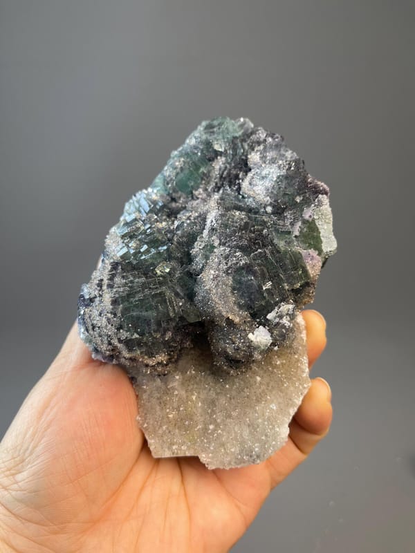Botryoidal CaF₂ fluorite with deep forest green color