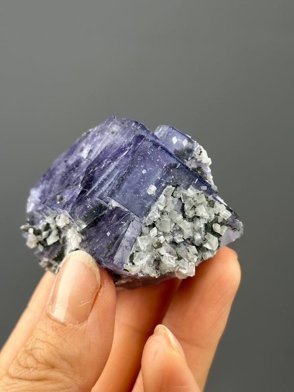 Close-up of purple fluorite twin crystal