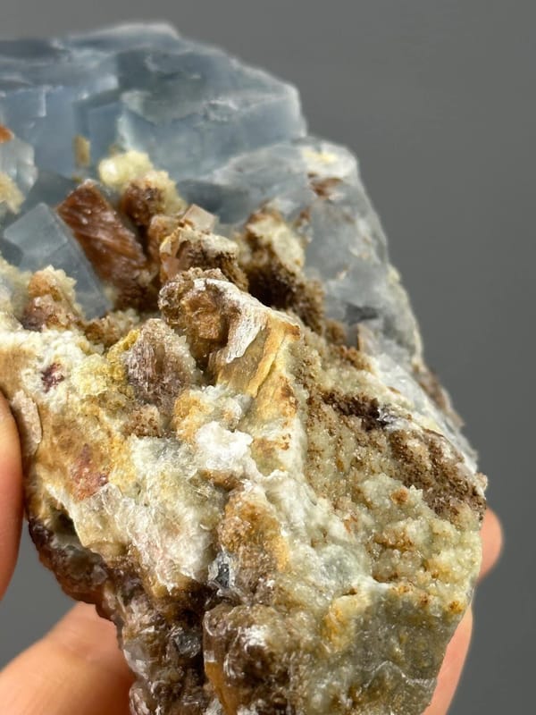 Detail of fluorite crystal surfaces on dolomite matrix