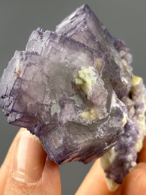 Front view of purple fluorite showing QR-code formation