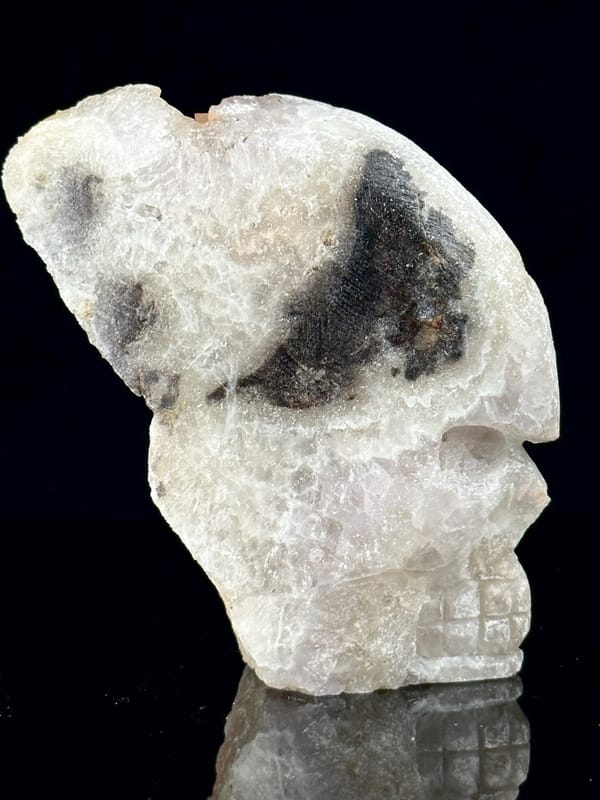 Side profile of quartz crystal skull, 3×1.9×2.4 in