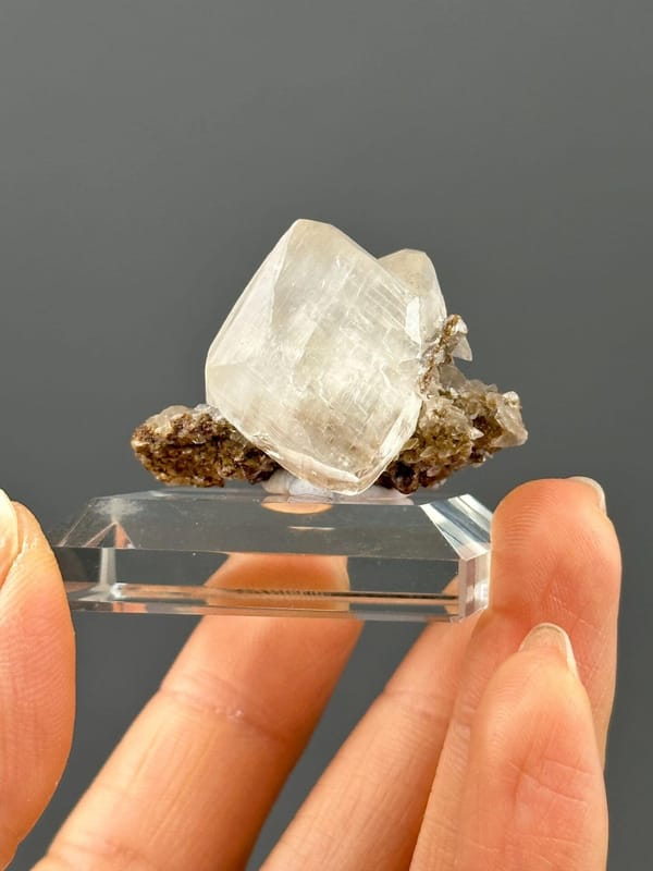 Back view of Hunan calcite crystal on matrix specimen