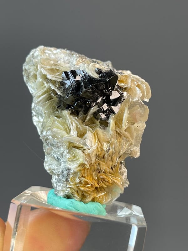 Cassiterite specimen measuring 1.5×1.2×1.0 inches, 1.06 oz