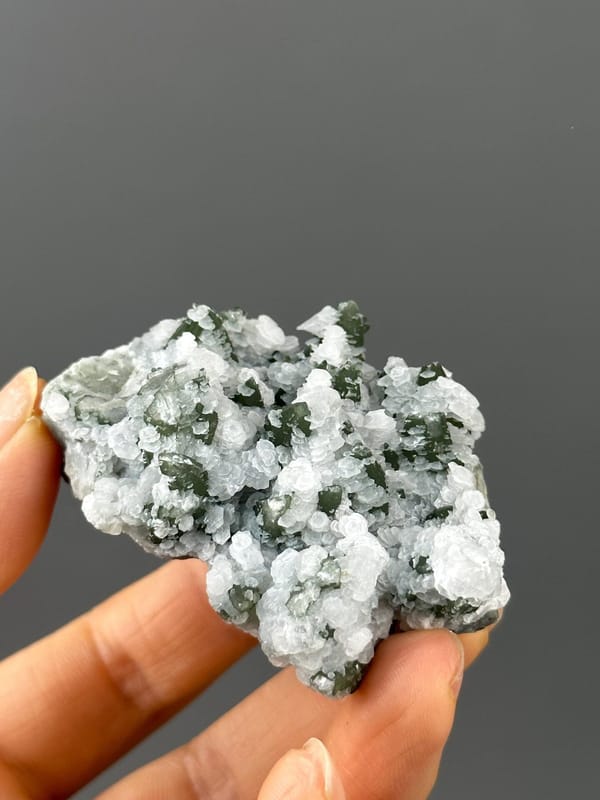 Angled view of flower calcite with green quartz