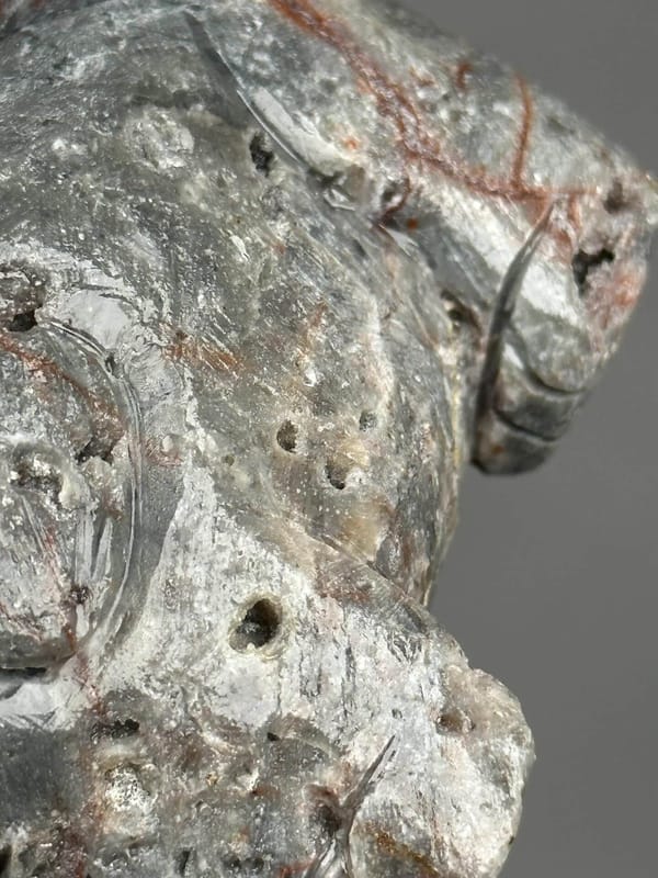 Angled view of garnet elephant sculpture