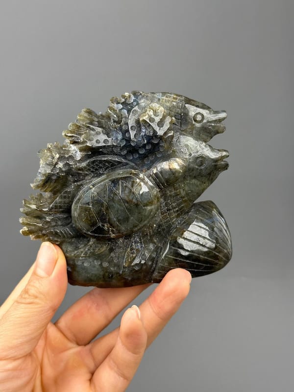 Labradorescence blue gold flash on carved labradorite
