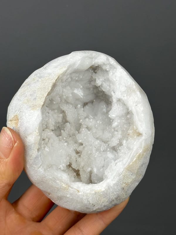 Full front view of large quartz geode display piece