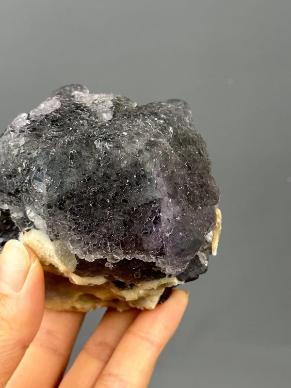 Full large twin fluorite specimen on white background
