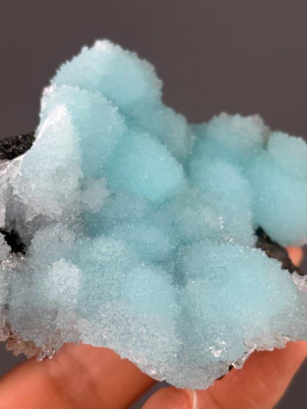 Cloud-like blue aragonite crystal formations