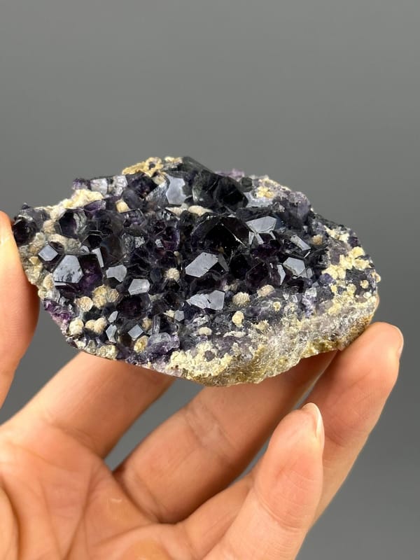 Purple fluorite cubic faces luster detail